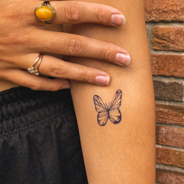 Fine Butterfly Tattoo